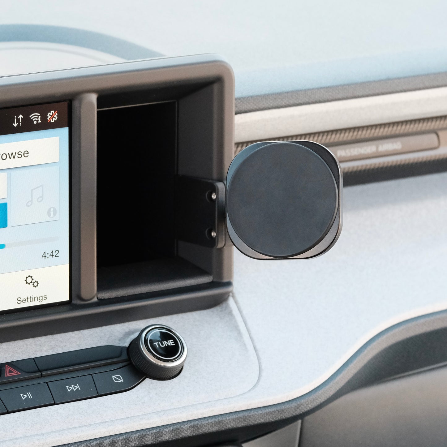 Image of Offroam MagSafe-compatible Phone Mount installed securely in Ford Maverick 2022-2024. This premium phone mount installs easily without drilling or glue. High force magnets hold phone on any trail, road, or track. Perfect placement without blocking screens, driver view, or air flow. Fully adjustable positioning.