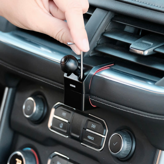 Image of Offroam Mounting Base installed securely in Chevrolet Suburban | Tahoe & GMC Yukon | Yukon XL 2021-2024. This premium all metal phone mounting base installs easily without drilling or glue. Perfect placement without blocking screens, driver view, or air flow.