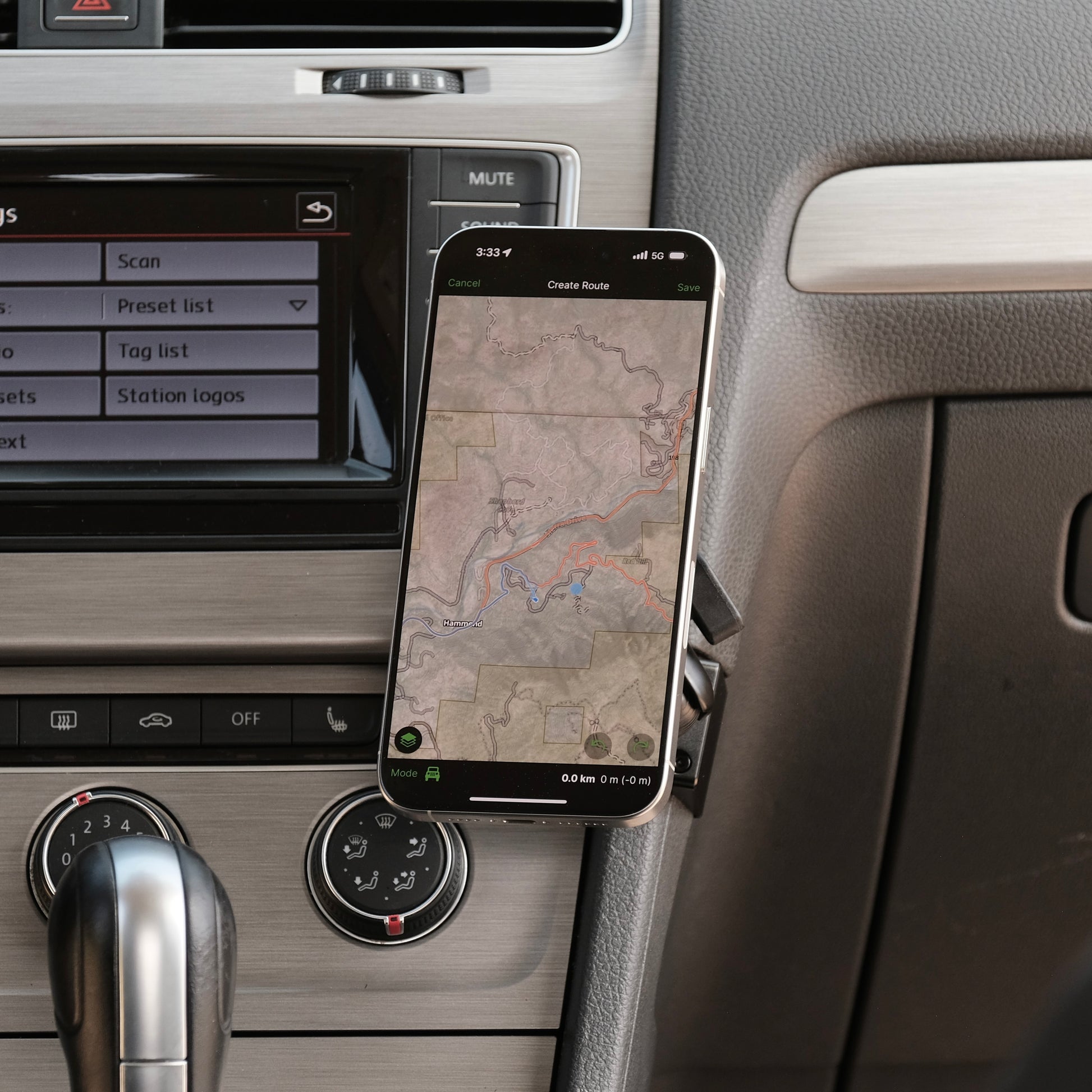 Image of Offroam MagSafe-compatible Phone Mount installed securely in Volkswagen Golf 2015-2021. This premium phone mount installs easily without drilling or glue. High force magnets hold phone on any trail, road, or track. Perfect placement without blocking screens, driver view, or air flow. Fully adjustable positioning.