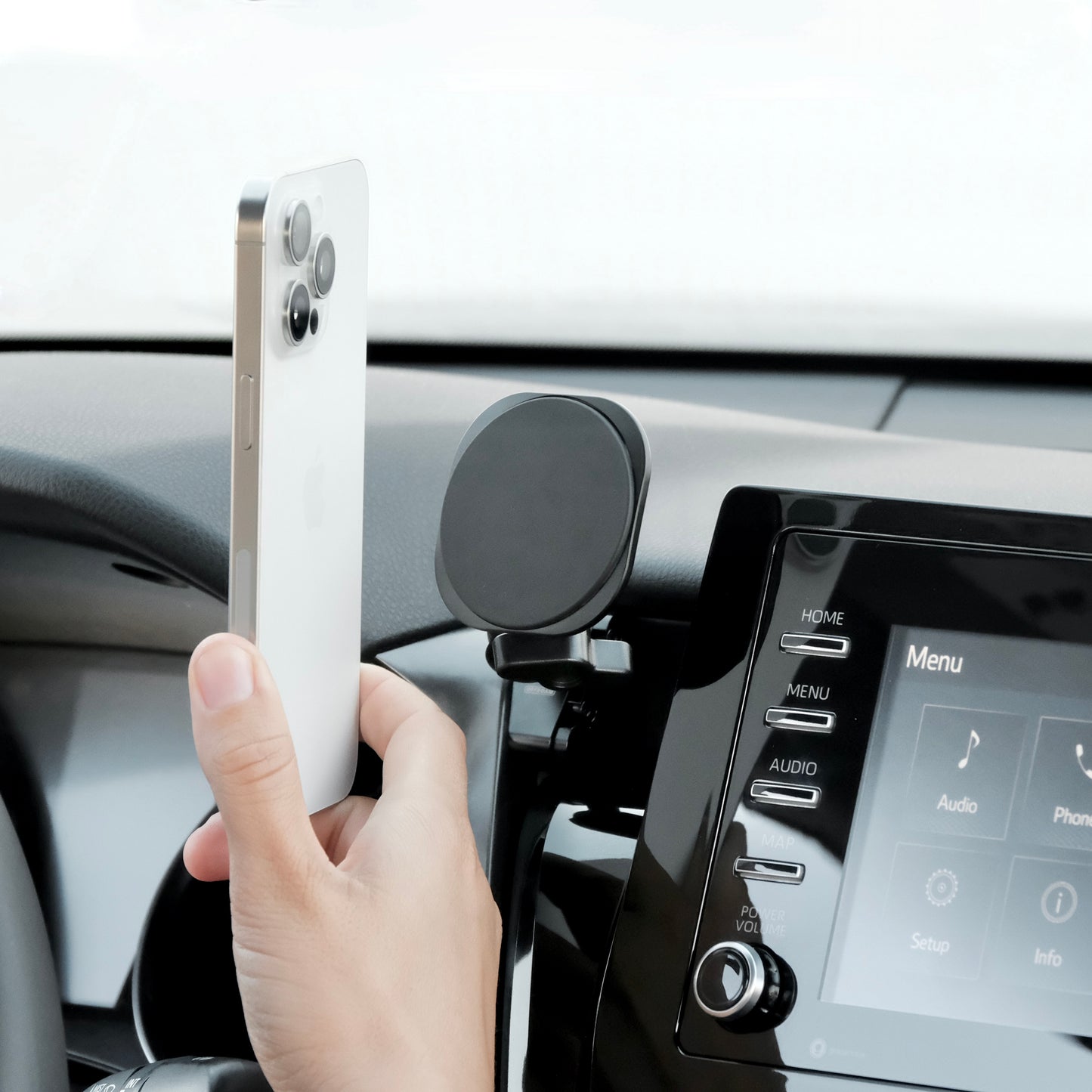 Image of Offroam MagSafe-compatible Phone Mount installed securely in Toyota Camry 2021-2024. This premium phone mount installs easily without drilling or glue. High force magnets hold phone on any trail, road, or track. Perfect placement without blocking screens, driver view, or air flow. Fully adjustable positioning.
