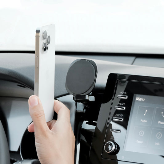 Image of Offroam MagSafe-compatible Phone Mount installed securely in Toyota Camry 2021-2024. This premium phone mount installs easily without drilling or glue. High force magnets hold phone on any trail, road, or track. Perfect placement without blocking screens, driver view, or air flow. Fully adjustable positioning.