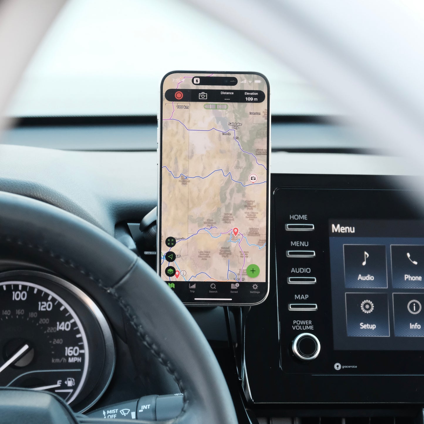 Image of Offroam MagSafe-compatible Phone Mount installed securely in Toyota Camry 2021-2024. This premium phone mount installs easily without drilling or glue. High force magnets hold phone on any trail, road, or track. Perfect placement without blocking screens, driver view, or air flow. Fully adjustable positioning.