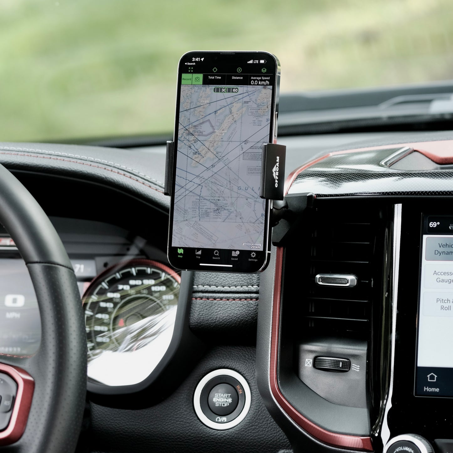Image of Offroam Phone Mount installed securely in Ram 1500/2500/3500 2019-2025. This premium phone mount installs easily without drilling or glue. Spring loaded Universal holder for use with any phone. Perfect placement without blocking screens, driver view, or air flow. Fully adjustable positioning.