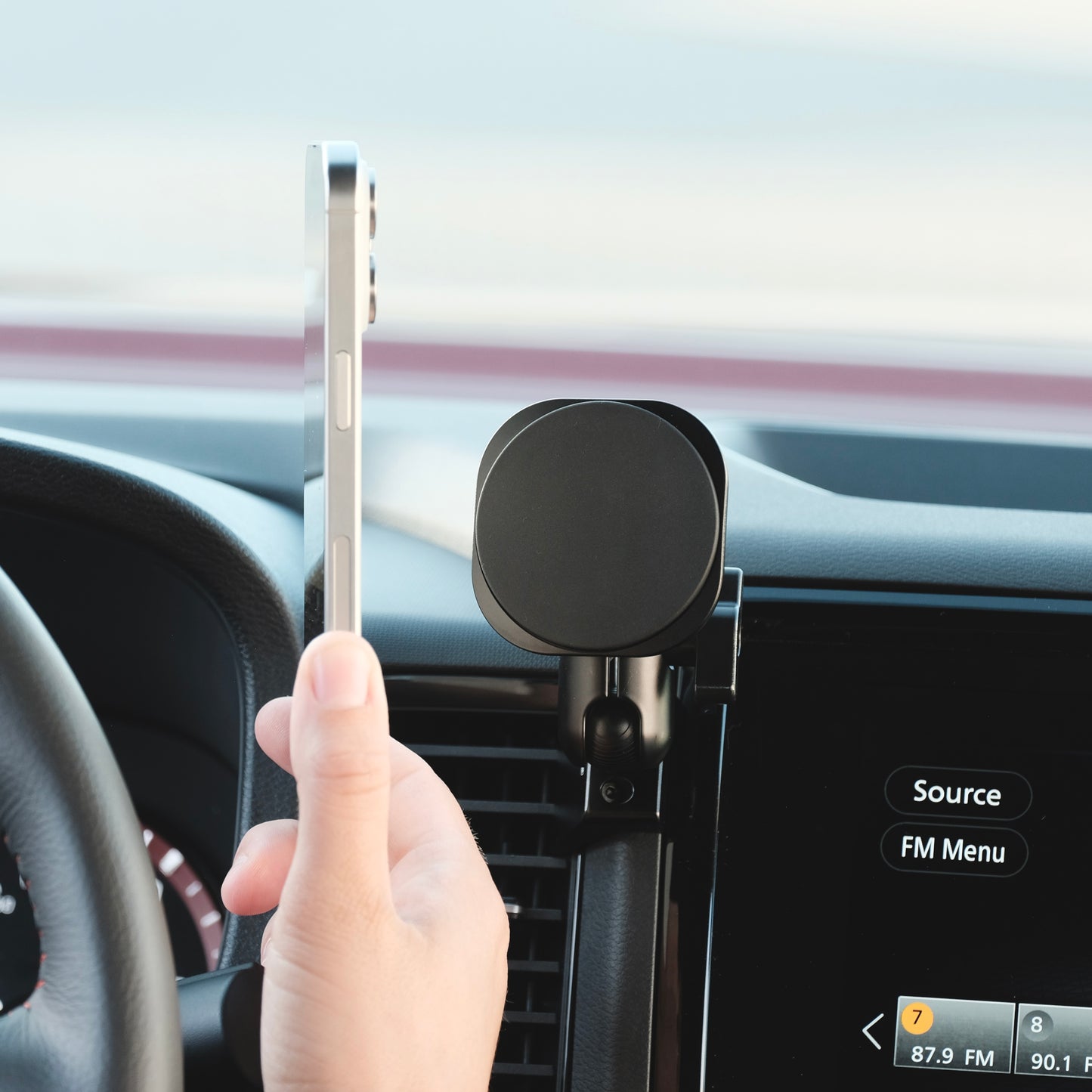Image of Offroam MagSafe-compatible Phone Mount installed securely in Nissan Frontier 2022-2024. This premium phone mount installs easily without drilling or glue. High force magnets hold phone on any trail, road, or track. Perfect placement without blocking screens, driver view, or air flow. Fully adjustable positioning.