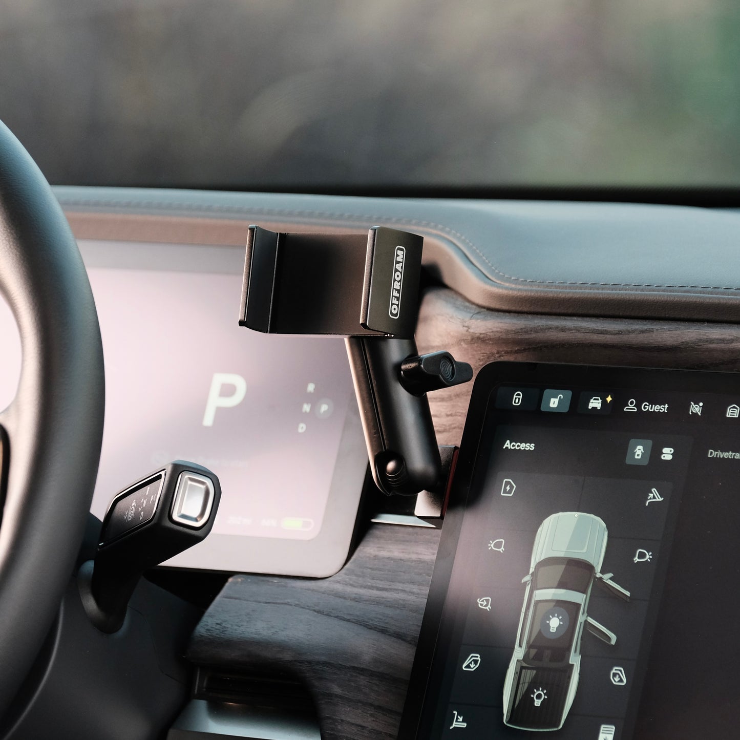Image of Offroam Phone Mount installed securely in Rivian R1T | R1S 2022-2025. This premium phone mount installs easily without drilling or glue. Spring loaded Universal holder for use with any phone. Perfect placement without blocking screens, driver view, or air flow. Fully adjustable positioning.