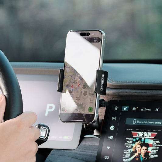 Image of Offroam Phone Mount installed securely in Rivian R1T | R1S 2022-2025. This premium phone mount installs easily without drilling or glue. Spring loaded Universal holder for use with any phone. Perfect placement without blocking screens, driver view, or air flow. Fully adjustable positioning.
