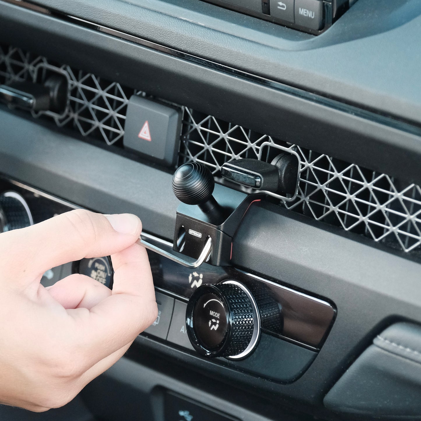 Image of Offroam Mounting Base installed securely in Honda Accord 2023-2025. This premium all metal phone mounting base installs easily without drilling or glue. Perfect placement without blocking screens, driver view, or air flow.