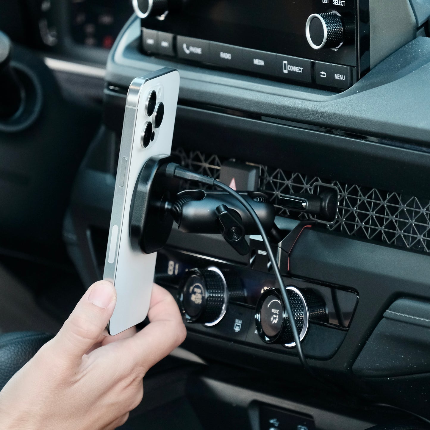 Image of Offroam MagSafe-compatible Phone Mount installed securely in Honda Accord 2023-2025. This premium phone mount installs easily without drilling or glue. High force magnets hold phone on any trail, road, or track. Perfect placement without blocking screens, driver view, or air flow. Fully adjustable positioning.