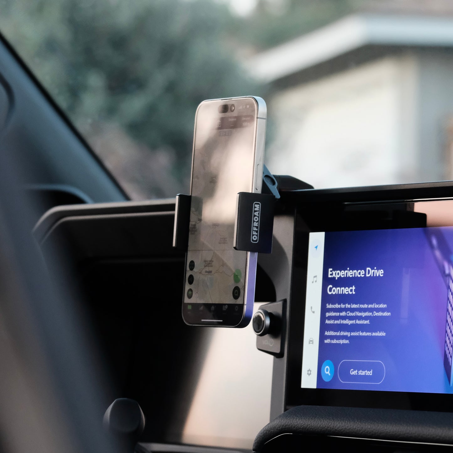 Image of Offroam Phone Mount installed securely in Toyota Land Cruiser 250 2024-2026. This premium phone mount installs easily without drilling or glue. Spring loaded Universal holder for use with any phone. Perfect placement without blocking screens, driver view, or air flow. Fully adjustable positioning.