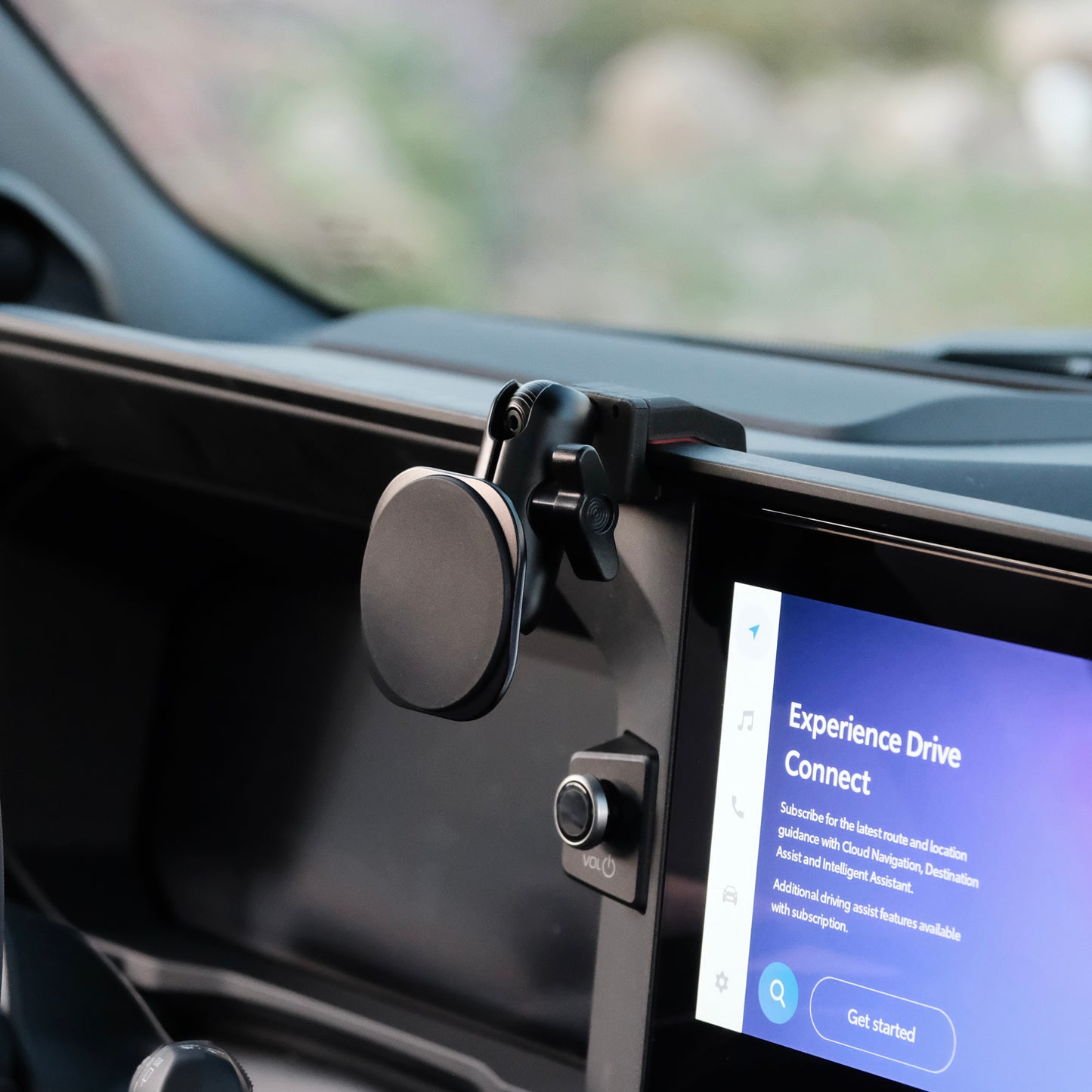 Image of Offroam MagSafe-compatible Phone Mount installed securely in Toyota Land Cruiser 250 2024-2026. This premium phone mount installs easily without drilling or glue. High force magnets hold phone on any trail, road, or track. Perfect placement without blocking screens, driver view, or air flow. Fully adjustable positioning.