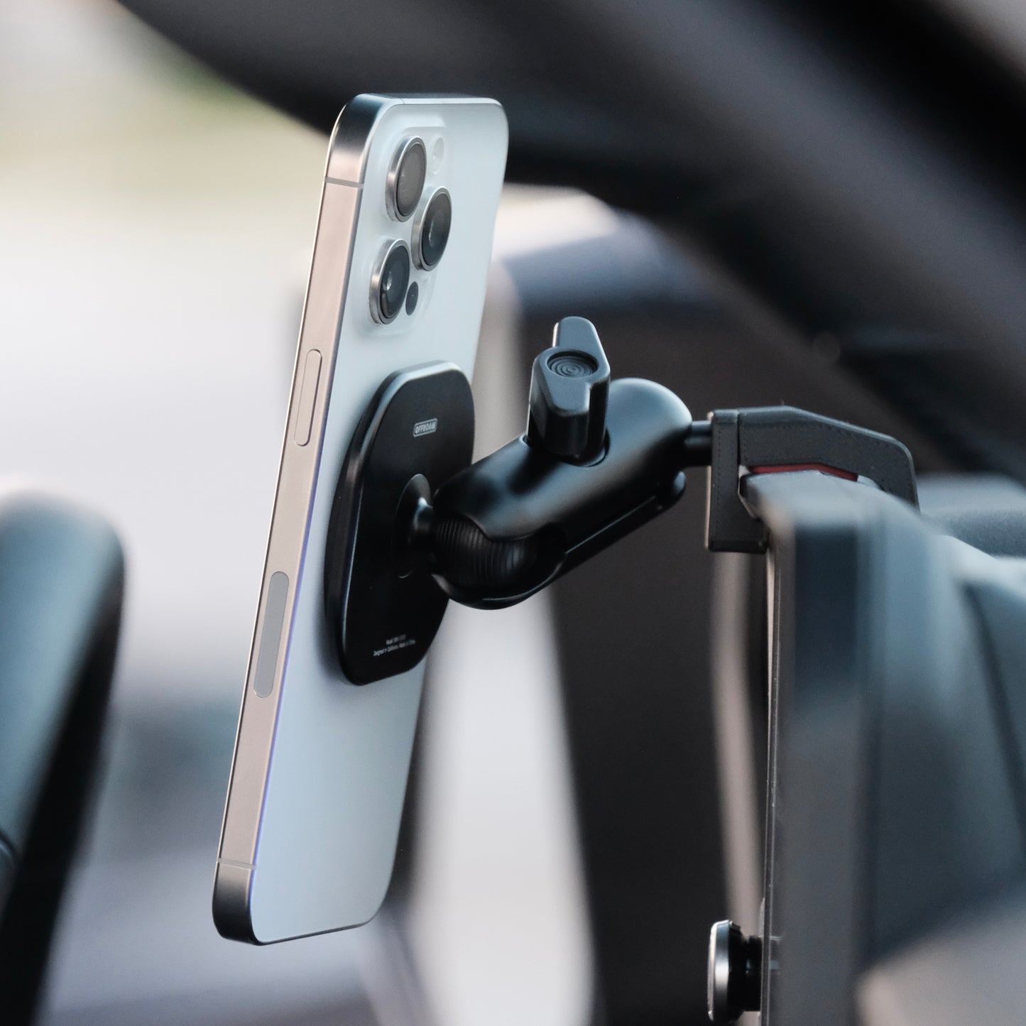 Image of Offroam MagSafe-compatible Phone Mount installed securely in Toyota Land Cruiser 250 2024-2026. This premium phone mount installs easily without drilling or glue. High force magnets hold phone on any trail, road, or track. Perfect placement without blocking screens, driver view, or air flow. Fully adjustable positioning.