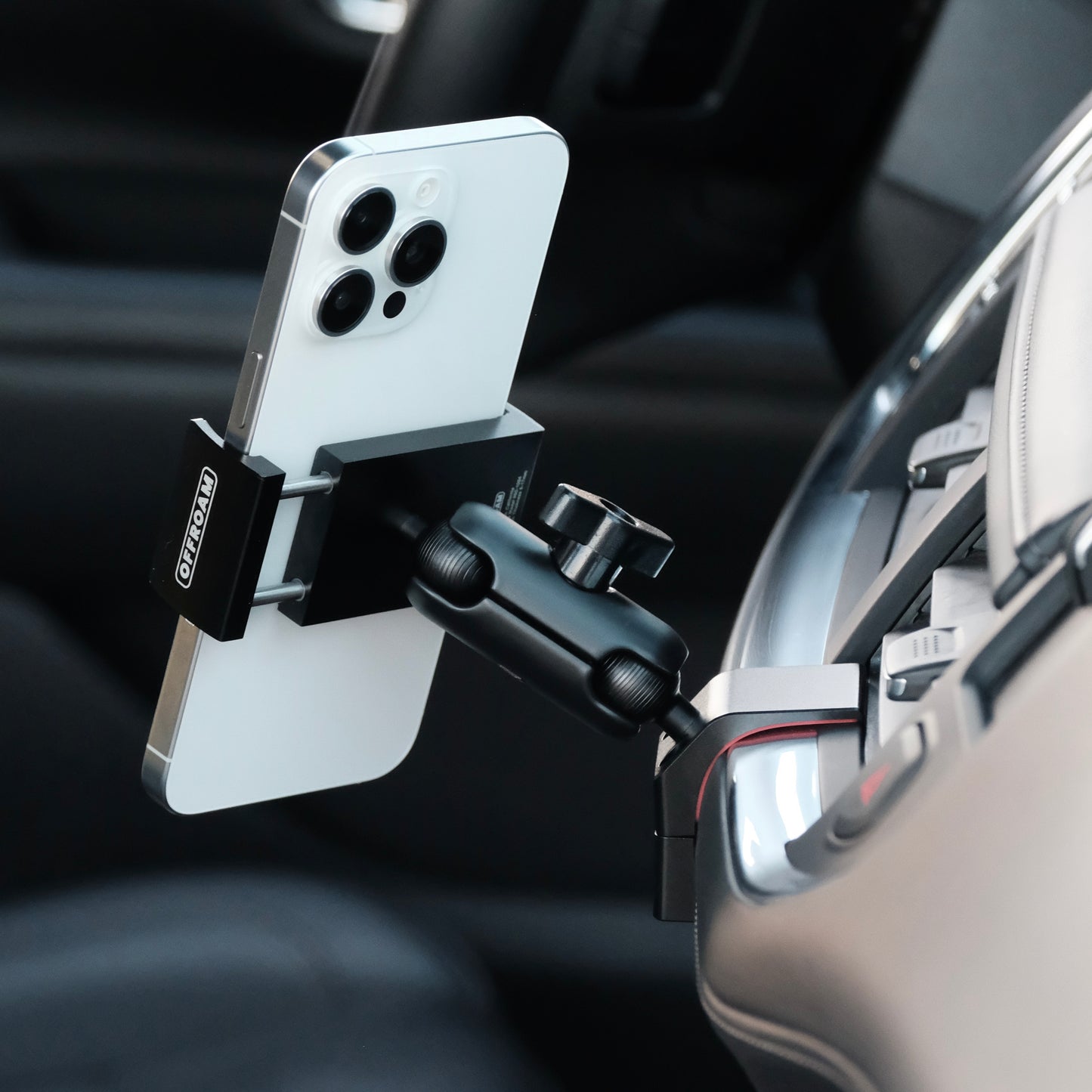 Image of Offroam Phone Mount installed securely in Chevrolet Suburban | Tahoe & GMC Yukon | Yukon XL 2021-2024. This premium phone mount installs easily without drilling or glue. Spring loaded Universal holder for use with any phone. Perfect placement without blocking screens, driver view, or air flow. Fully adjustable positioning.