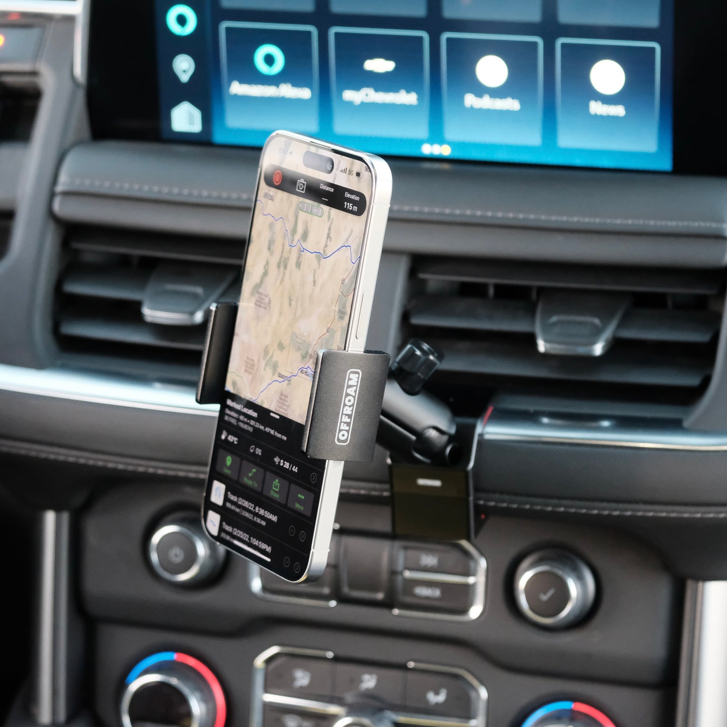 Image of Offroam Phone Mount installed securely in Chevrolet Suburban | Tahoe & GMC Yukon | Yukon XL 2021-2024. This premium phone mount installs easily without drilling or glue. Spring loaded Universal holder for use with any phone. Perfect placement without blocking screens, driver view, or air flow. Fully adjustable positioning.