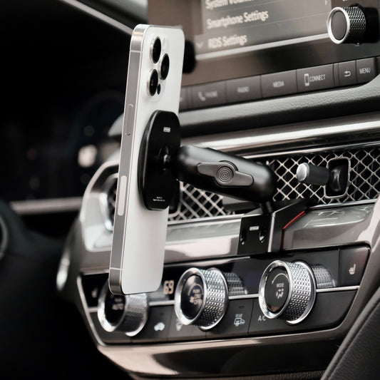 Image of Offroam MagSafe-compatible Phone Mount installed securely in Acura Integra 2023-2025. This premium phone mount installs easily without drilling or glue. High force magnets hold phone on any trail, road, or track. Perfect placement without blocking screens, driver view, or air flow. Fully adjustable positioning.