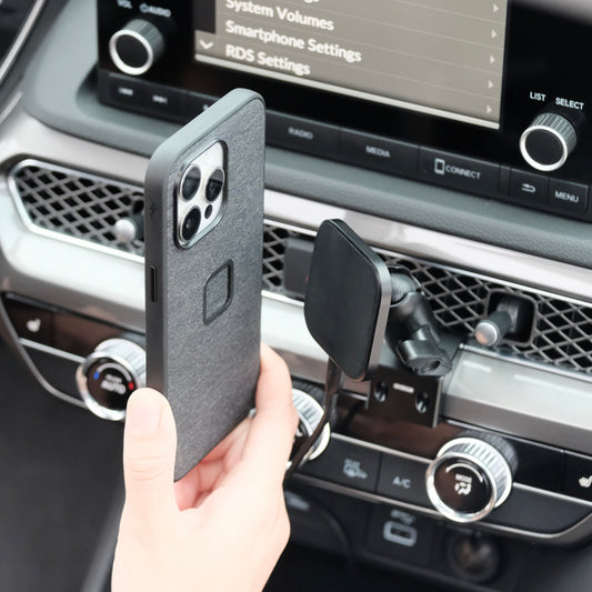 Image of Offroam MagSafe-compatible Phone Mount installed securely in Acura Integra 2023-2025. This premium phone mount installs easily without drilling or glue. High force magnets hold phone on any trail, road, or track. Perfect placement without blocking screens, driver view, or air flow. Fully adjustable positioning.