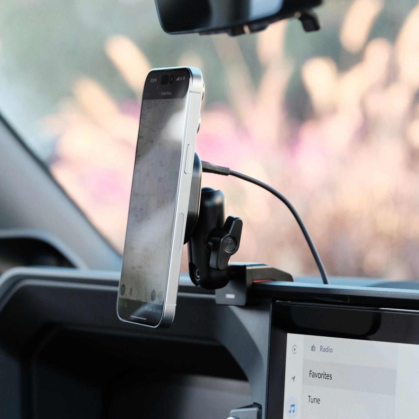 Image of Offroam MagSafe-compatible Phone Mount installed securely in Toyota Land Cruiser 250 2024-2026. This premium phone mount installs easily without drilling or glue. High force magnets hold phone on any trail, road, or track. Perfect placement without blocking screens, driver view, or air flow. Fully adjustable positioning.