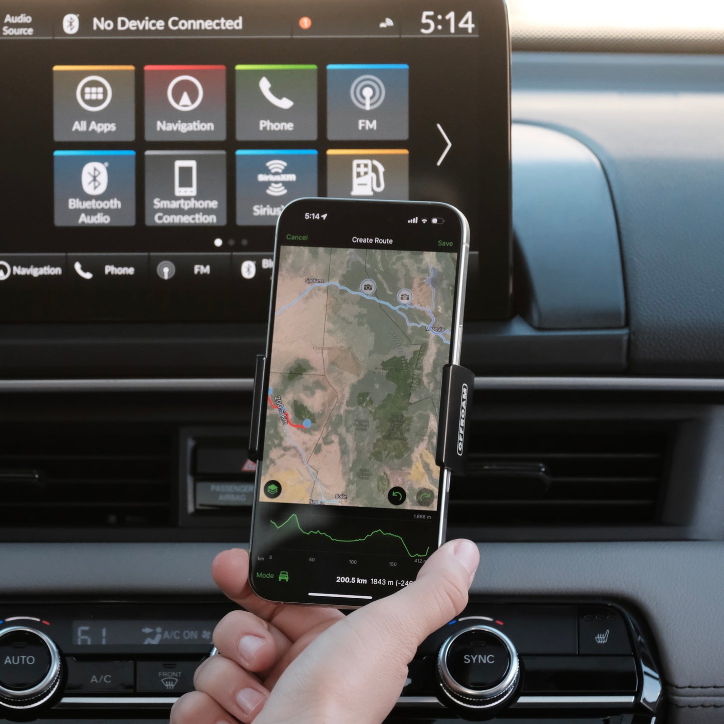 Image of Offroam Phone Mount installed securely in Honda Pilot 2023-2025 | Passport 2026. This premium phone mount installs easily without drilling or glue. Spring loaded Universal holder for use with any phone. Perfect placement without blocking screens, driver view, or air flow. Fully adjustable positioning.