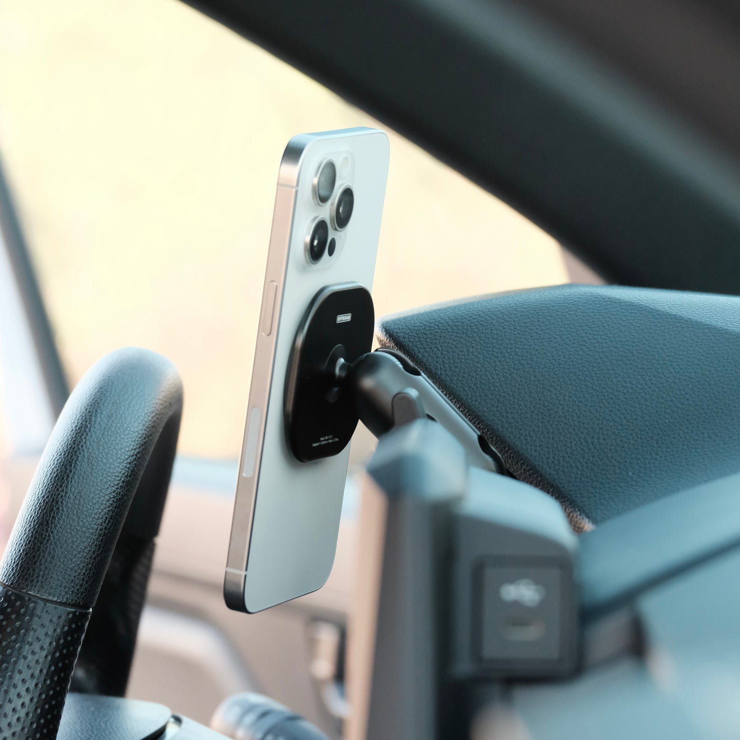 Image of Offroam MagSafe-compatible Phone Mount installed securely in Toyota Tacoma 2024-2025 | 4Runner 2025. This premium phone mount installs easily without drilling or glue. High force magnets hold phone on any trail, road, or track. Perfect placement without blocking screens, driver view, or air flow. Fully adjustable positioning.