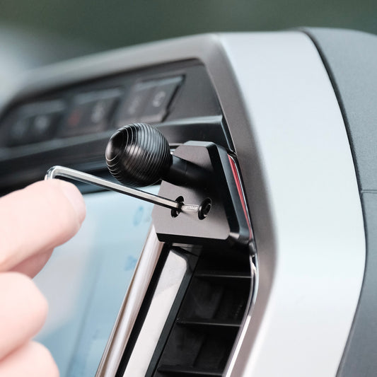 Image of Offroam Mounting Base installed securely in Ford Super Duty 2022 (12in. SYNC4 Touchscreen). This premium all metal phone mounting base installs easily without drilling or glue. Perfect placement without blocking screens, driver view, or air flow.