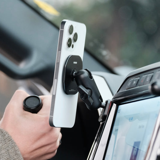 Image of Offroam MagSafe-compatible Phone Mount installed securely in Ford Super Duty 2022 (12in. SYNC4 Touchscreen). This premium phone mount installs easily without drilling or glue. High force magnets hold phone on any trail, road, or track. Perfect placement without blocking screens, driver view, or air flow. Fully adjustable positioning.