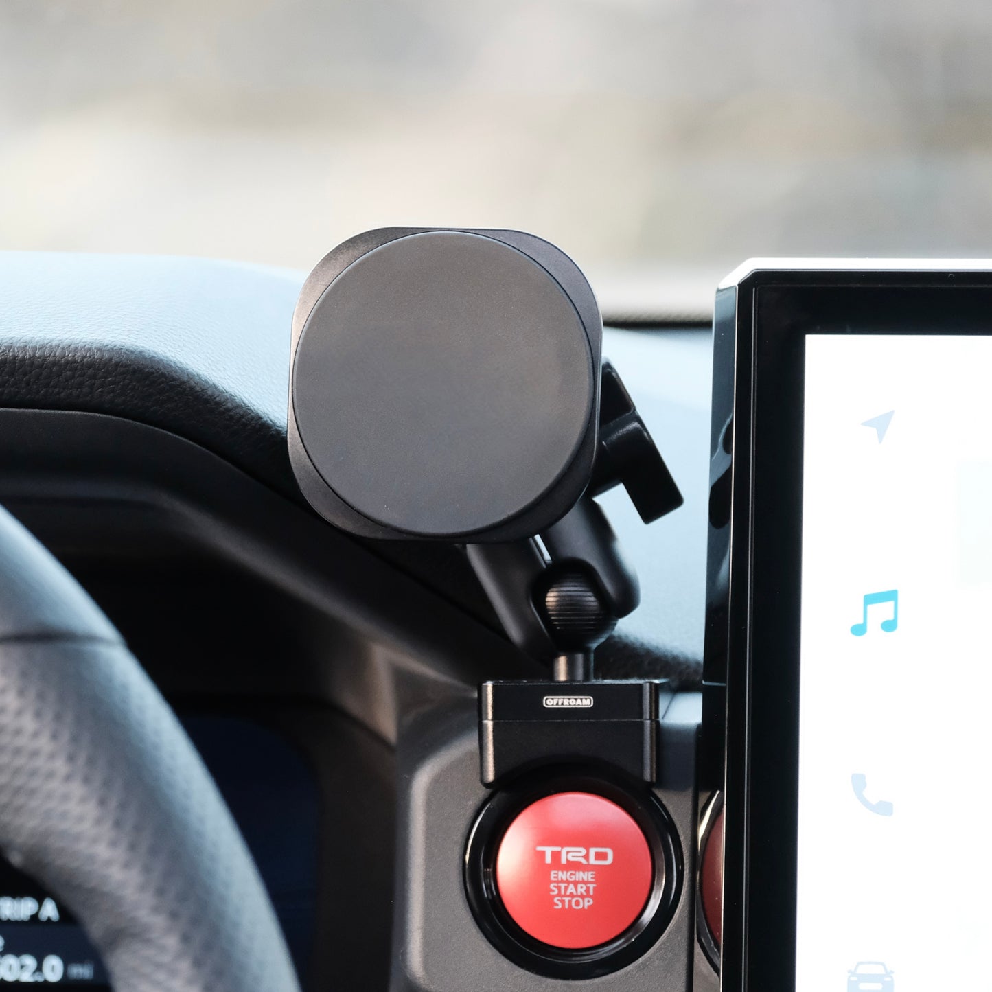 Image of Offroam MagSafe-compatible Phone Mount installed securely in Toyota Tacoma 2024-2025 | 4Runner 2025. This premium phone mount installs easily without drilling or glue. High force magnets hold phone on any trail, road, or track. Perfect placement without blocking screens, driver view, or air flow. Fully adjustable positioning.