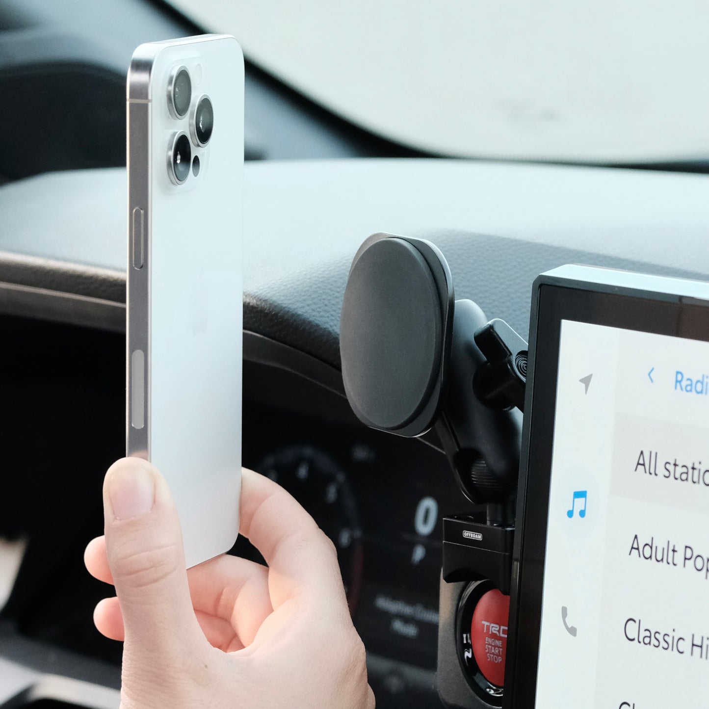 Image of Offroam MagSafe-compatible Phone Mount installed securely in Toyota Tacoma 2024-2025 | 4Runner 2025. This premium phone mount installs easily without drilling or glue. High force magnets hold phone on any trail, road, or track. Perfect placement without blocking screens, driver view, or air flow. Fully adjustable positioning.
