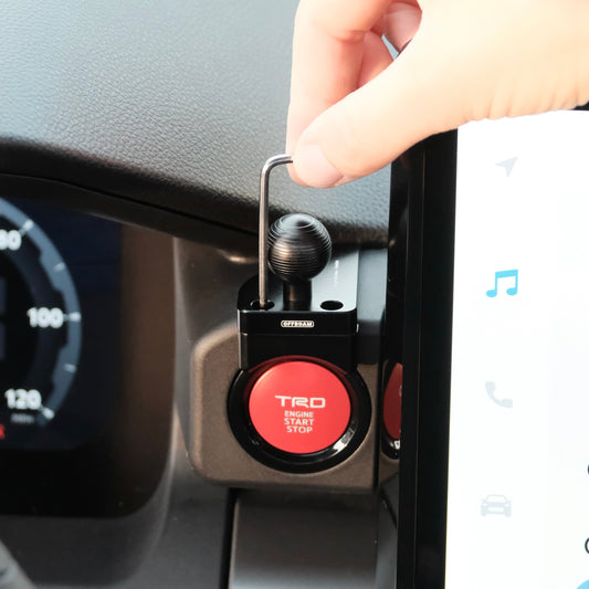 Image of Offroam Mounting Base installed securely in Toyota Tacoma 2024-2025 | 4Runner 2025. This premium all metal phone mounting base installs easily without drilling or glue. Perfect placement without blocking screens, driver view, or air flow.