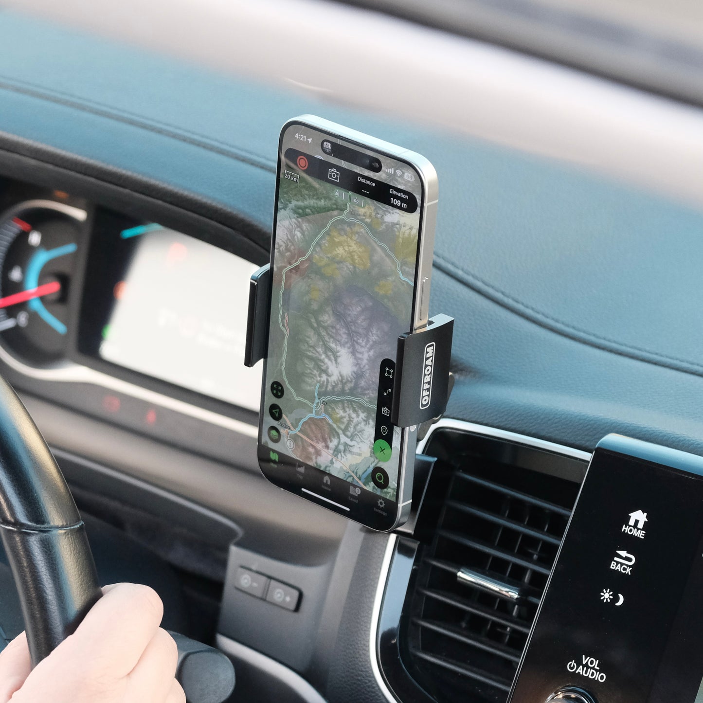 Image of Offroam Phone Mount installed securely in Honda Ridgeline 2016-2025 | Passport 2019-2025 | Pilot 2016-2022. This premium phone mount installs easily without drilling or glue. Spring loaded Universal holder for use with any phone. Perfect placement without blocking screens, driver view, or air flow. Fully adjustable positioning.