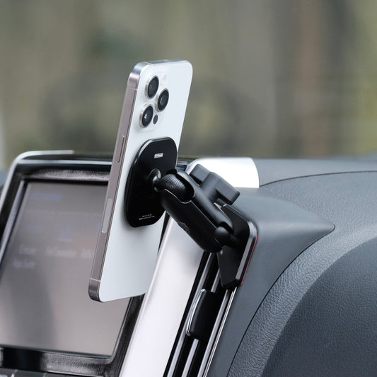 Image of Offroam MagSafe-compatible Phone Mount installed securely in Toyota Land Cruiser 200 2016-2021. This premium phone mount installs easily without drilling or glue. High force magnets hold phone on any trail, road, or track. Perfect placement without blocking screens, driver view, or air flow. Fully adjustable positioning.