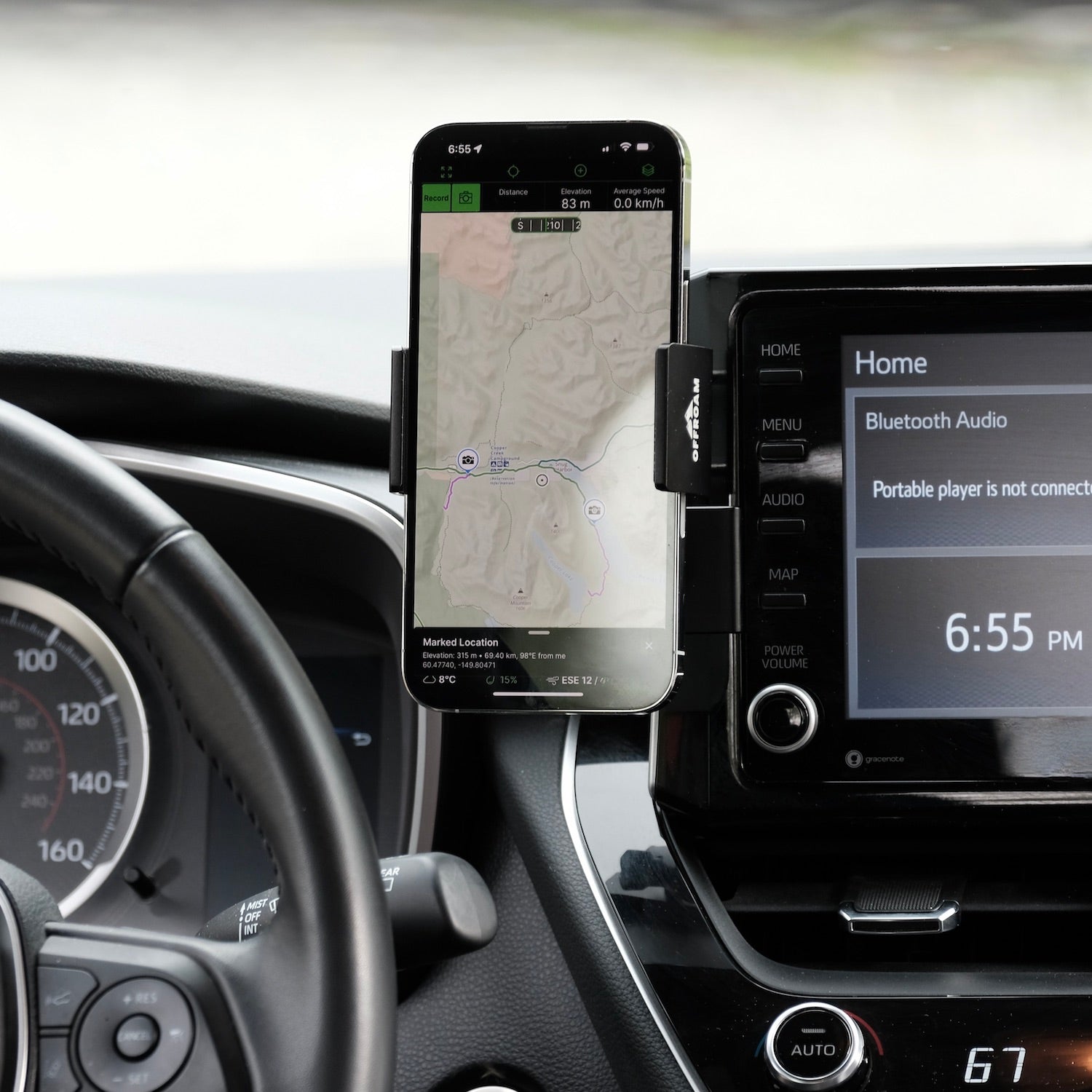 Image of Offroam Phone Mount installed securely in Toyota Corolla 2020-2026 | Corolla Cross 2022-2026. This premium phone mount installs easily without drilling or glue. Spring loaded Universal holder for use with any phone. Perfect placement without blocking screens, driver view, or air flow. Fully adjustable positioning.