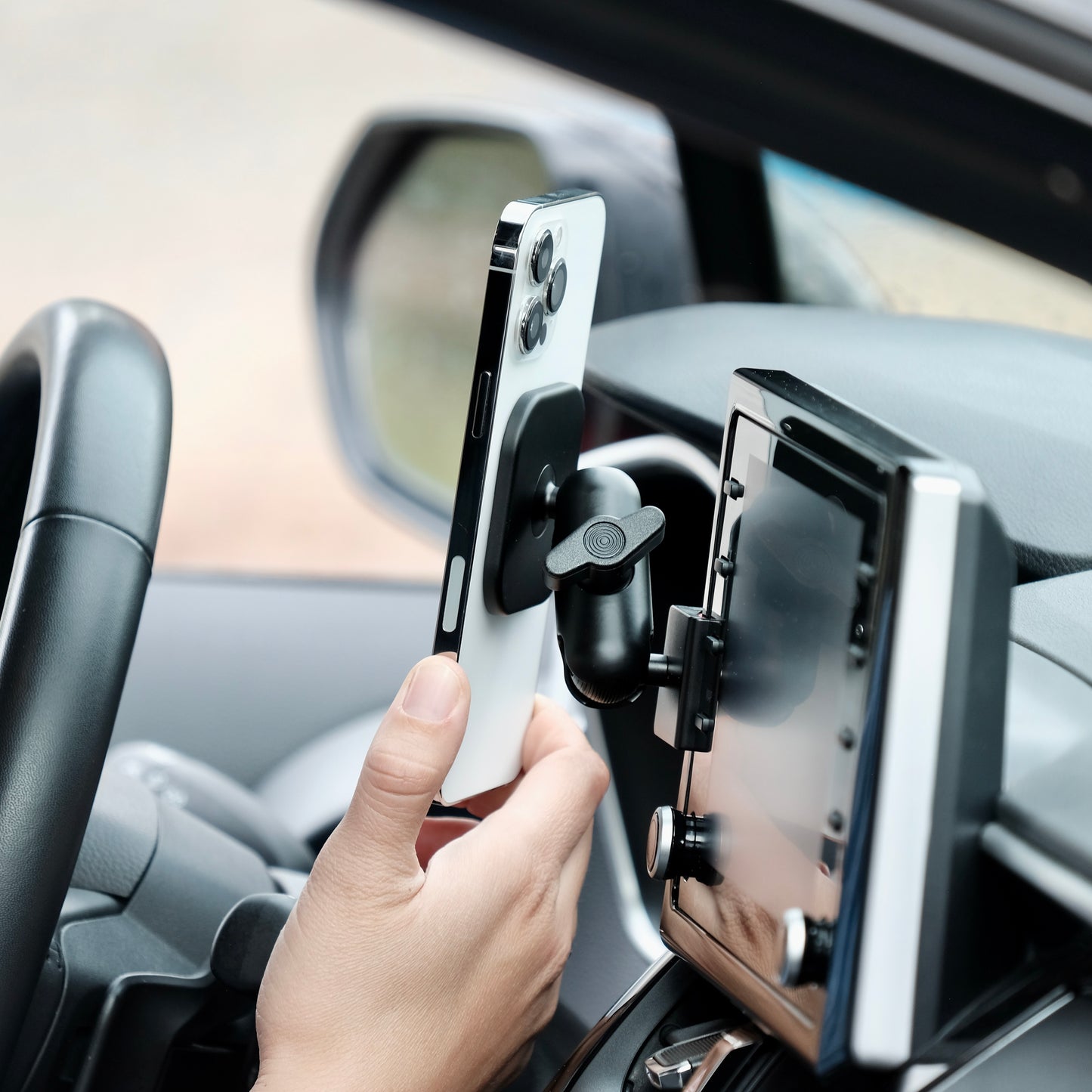 Image of Offroam MagSafe-compatible Phone Mount installed securely in Toyota Corolla 2020-2026 | Corolla Cross 2022-2026. This premium phone mount installs easily without drilling or glue. High force magnets hold phone on any trail, road, or track. Perfect placement without blocking screens, driver view, or air flow. Fully adjustable positioning.