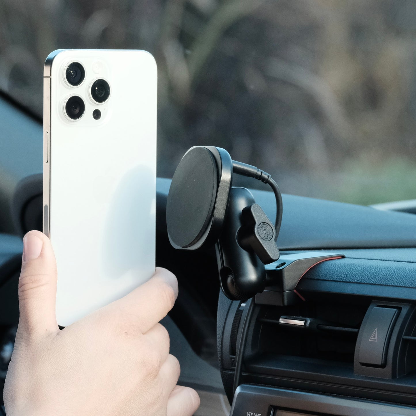 Image of Offroam MagSafe-compatible Phone Mount installed securely in Subaru BRZ 2022-2026 | Toyota GR86 2022-2026. This premium phone mount installs easily without drilling or glue. High force magnets hold phone on any trail, road, or track. Perfect placement without blocking screens, driver view, or air flow. Fully adjustable positioning.