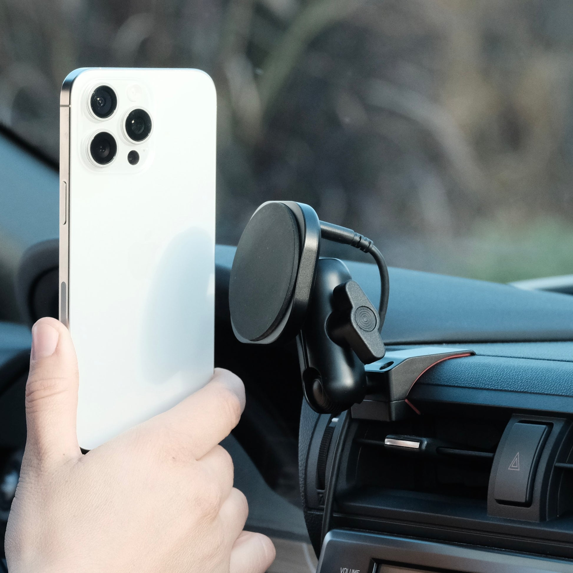 Image of Offroam MagSafe-compatible Phone Mount installed securely in Subaru BRZ 2022-2026 | Toyota GR86 2022-2026. This premium phone mount installs easily without drilling or glue. High force magnets hold phone on any trail, road, or track. Perfect placement without blocking screens, driver view, or air flow. Fully adjustable positioning.