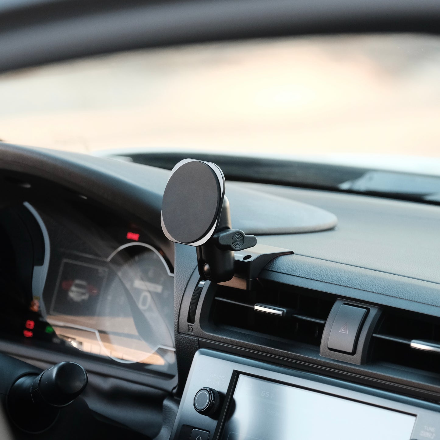 Image of Offroam MagSafe-compatible Phone Mount installed securely in Subaru BRZ 2022-2026 | Toyota GR86 2022-2026. This premium phone mount installs easily without drilling or glue. High force magnets hold phone on any trail, road, or track. Perfect placement without blocking screens, driver view, or air flow. Fully adjustable positioning.