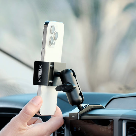 Image of Offroam Phone Mount installed securely in Ford Ranger 2024-2025. This premium phone mount installs easily without drilling or glue. Spring loaded Universal holder for use with any phone. Perfect placement without blocking screens, driver view, or air flow. Fully adjustable positioning.