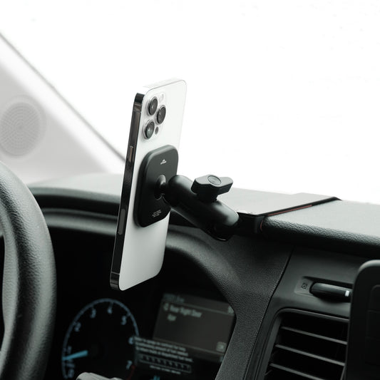 Image of Offroam MagSafe-compatible Phone Mount installed securely in Ford Transit 2020-2025. This premium phone mount installs easily without drilling or glue. High force magnets hold phone on any trail, road, or track. Perfect placement without blocking screens, driver view, or air flow. Fully adjustable positioning.