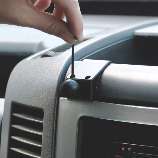 Image of Offroam Mounting Base installed securely in Mercedes-Benz Sprinter 2007-2018. This premium all metal phone mounting base installs easily without drilling or glue. Perfect placement without blocking screens, driver view, or air flow.