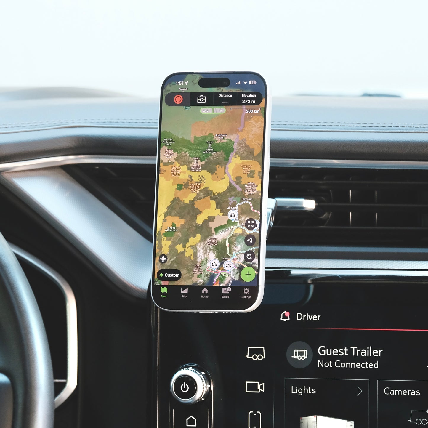 Image of Offroam MagSafe-compatible Phone Mount installed securely in GMC Sierra 1500 2022-2026 | Sierra HD 2024-2026 (AT4, AT4x, Denali, Denali Ultimate). This premium phone mount installs easily without drilling or glue. High force magnets hold phone on any trail, road, or track. Perfect placement without blocking screens, driver view, or air flow. Fully adjustable positioning.