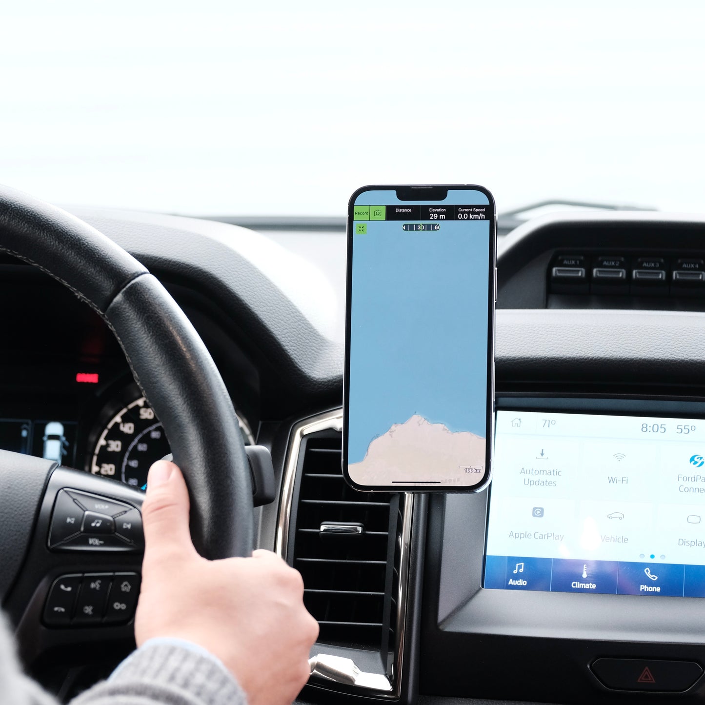 Image of Offroam MagSafe-compatible Phone Mount installed securely in Ford Ranger 2019-2023. This premium phone mount installs easily without drilling or glue. High force magnets hold phone on any trail, road, or track. Perfect placement without blocking screens, driver view, or air flow. Fully adjustable positioning.