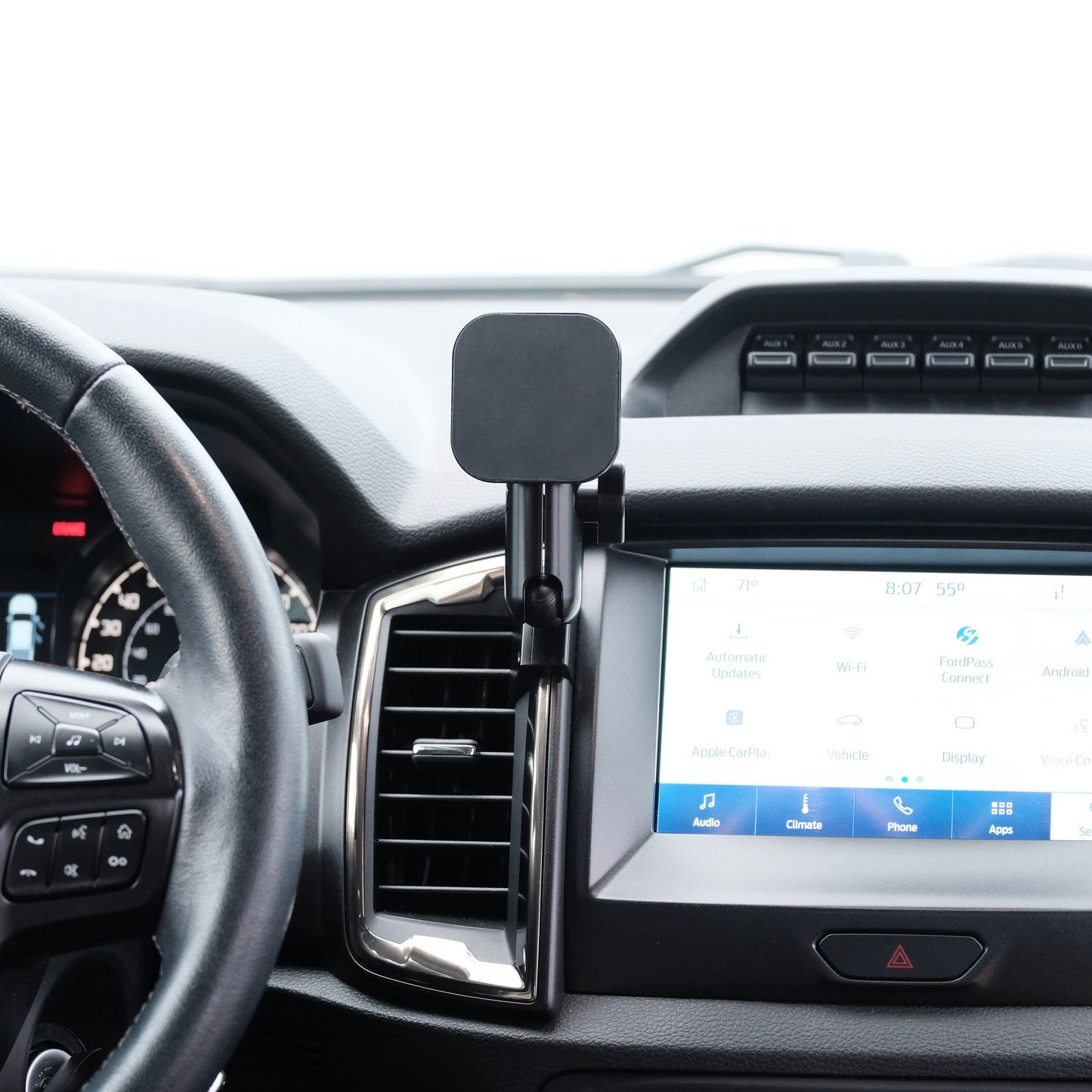 Image of Offroam MagSafe-compatible Phone Mount installed securely in Ford Ranger 2019-2023. This premium phone mount installs easily without drilling or glue. High force magnets hold phone on any trail, road, or track. Perfect placement without blocking screens, driver view, or air flow. Fully adjustable positioning.