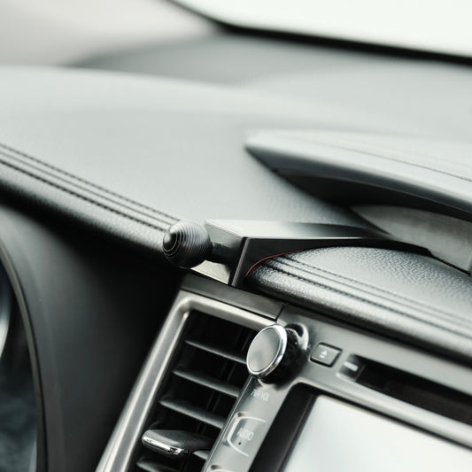Image of Offroam Mounting Base installed securely in Toyota Highlander 2014-2019. This premium all metal phone mounting base installs easily without drilling or glue. Perfect placement without blocking screens, driver view, or air flow.