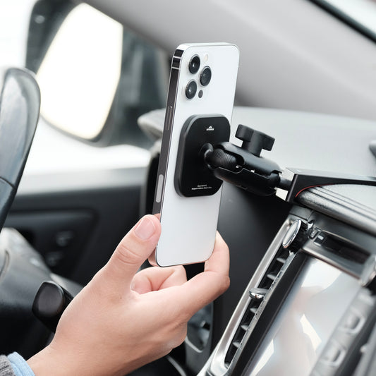 Image of Offroam MagSafe-compatible Phone Mount installed securely in Toyota Highlander 2014-2019. This premium phone mount installs easily without drilling or glue. High force magnets hold phone on any trail, road, or track. Perfect placement without blocking screens, driver view, or air flow. Fully adjustable positioning.