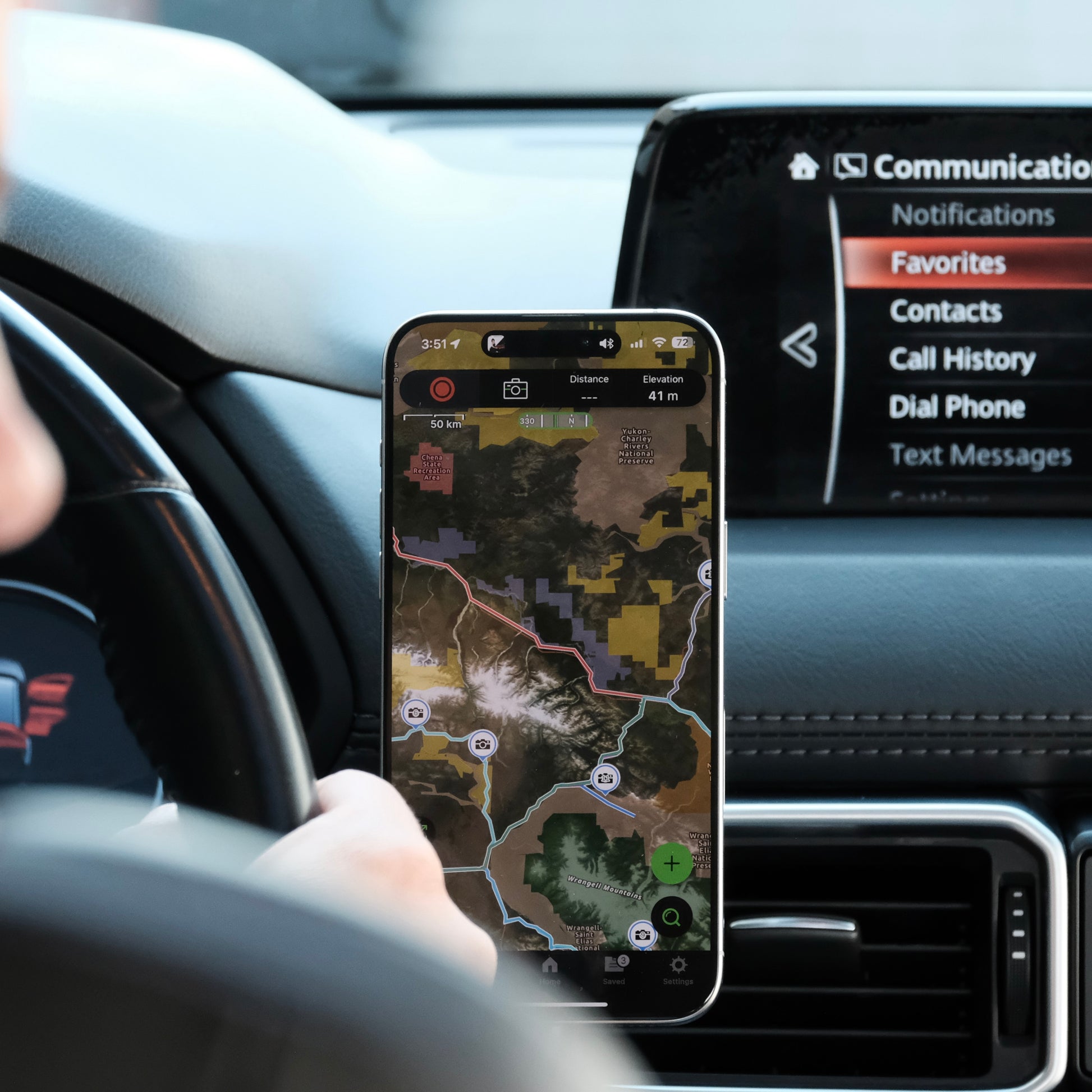 Image of Offroam MagSafe-compatible Phone Mount installed securely in Mazda CX-5 2017-2025. This premium phone mount installs easily without drilling or glue. High force magnets hold phone on any trail, road, or track. Perfect placement without blocking screens, driver view, or air flow. Fully adjustable positioning.