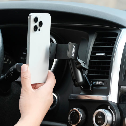 Image of Offroam Phone Mount installed securely in Toyota Tundra 2007-2013 | Sequoia 2008-2022. This premium phone mount installs easily without drilling or glue. Spring loaded Universal holder for use with any phone. Perfect placement without blocking screens, driver view, or air flow. Fully adjustable positioning.