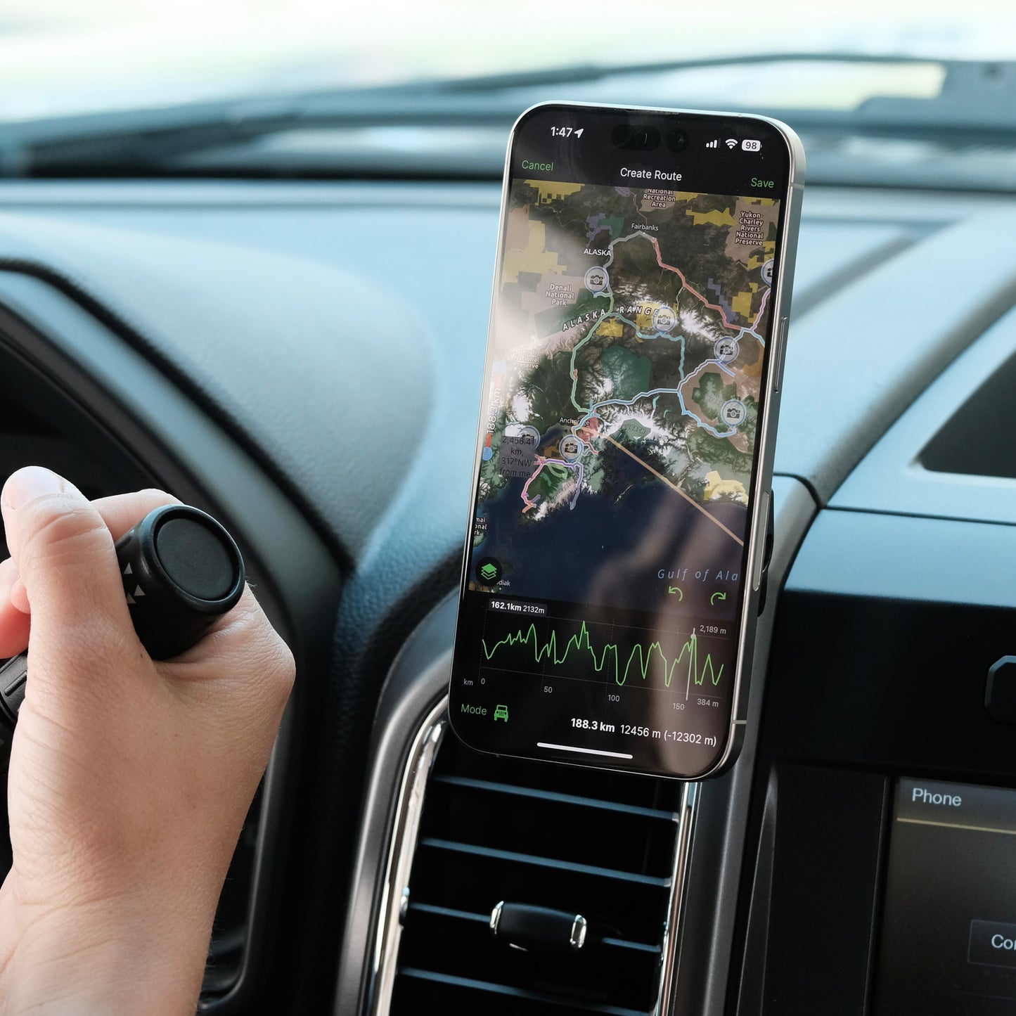 Image of Offroam MagSafe-compatible Phone Mount installed securely in Ford F-150 2015-2020 | Super Duty 2017-2021 & 2022 (XL and XLT) | Expedition 2018-2021. This premium phone mount installs easily without drilling or glue. High force magnets hold phone on any trail, road, or track. Perfect placement without blocking screens, driver view, or air flow. Fully adjustable positioning.