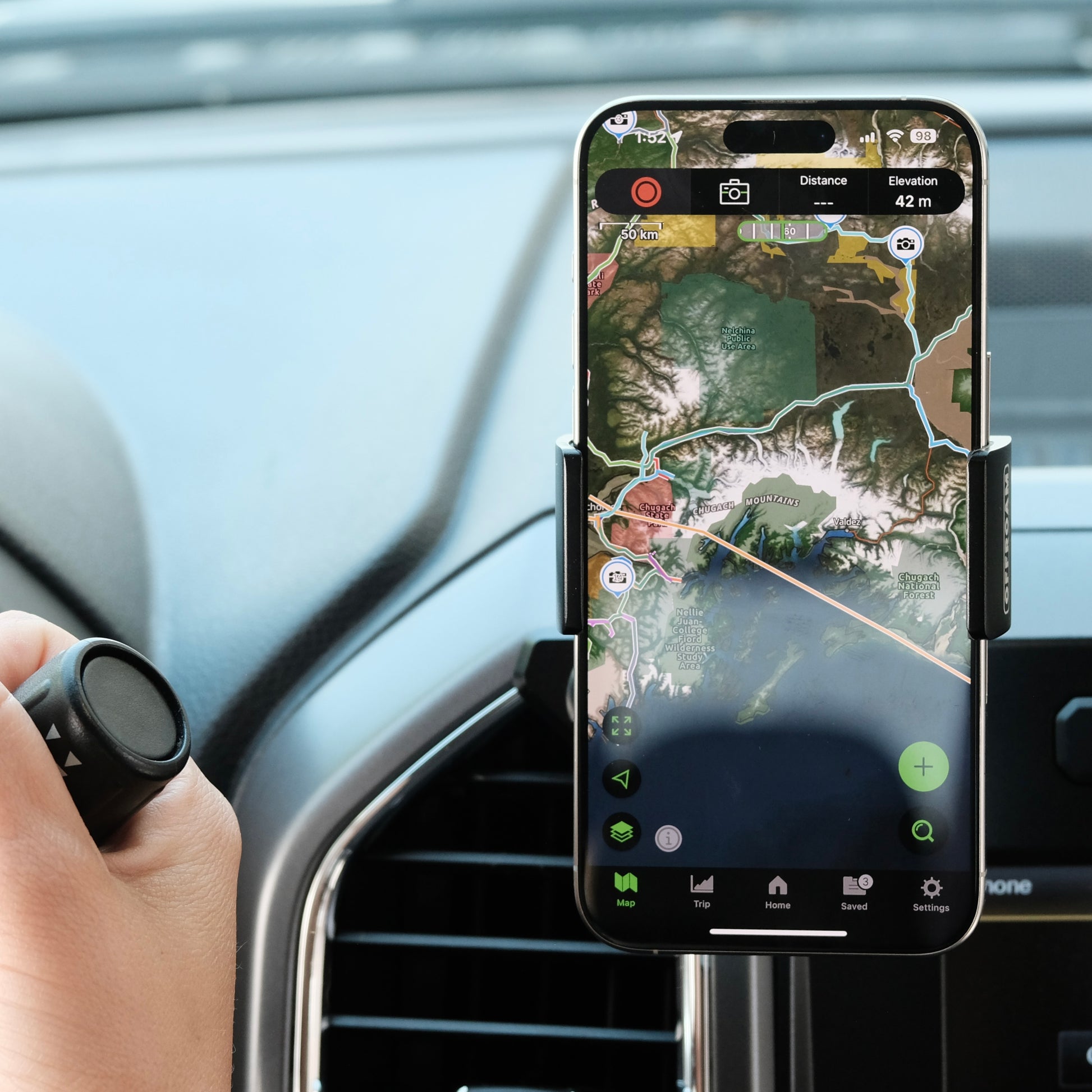 Image of Offroam Phone Mount installed securely in Ford F-150  2015-2020 | Super Duty 2017-2021 & 2022 (XL and XLT) | Expedition 2018-2021. This premium phone mount installs easily without drilling or glue. Spring loaded Universal holder for use with any phone. Perfect placement without blocking screens, driver view, or air flow. Fully adjustable positioning.