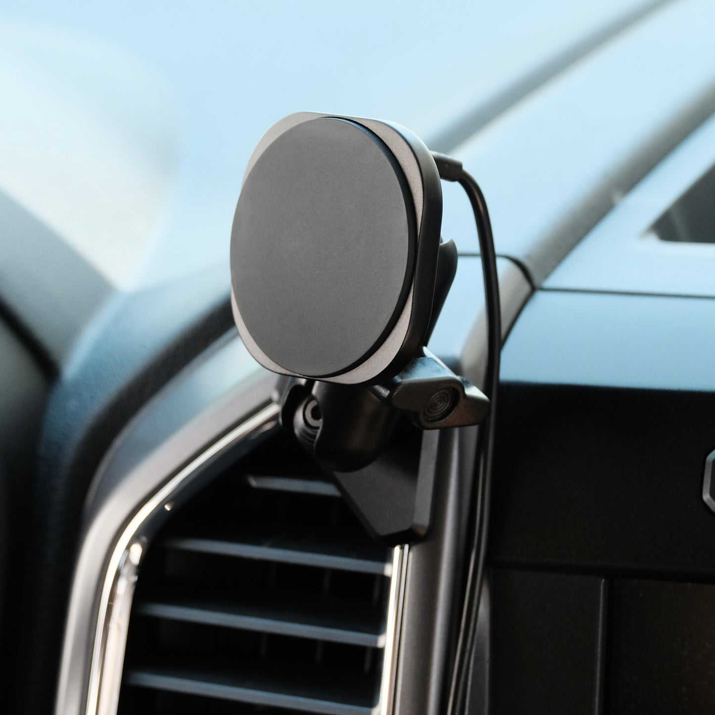 Image of Offroam MagSafe-compatible Phone Mount installed securely in Ford F-150 2015-2020 | Super Duty 2017-2021 & 2022 (XL and XLT) | Expedition 2018-2021. This premium phone mount installs easily without drilling or glue. High force magnets hold phone on any trail, road, or track. Perfect placement without blocking screens, driver view, or air flow. Fully adjustable positioning.
