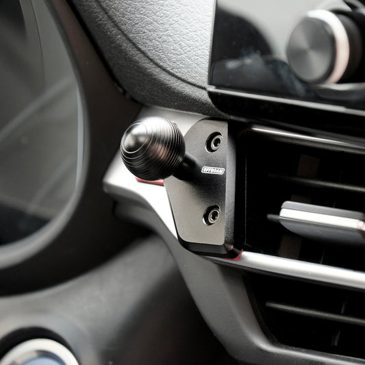 Image of Offroam Mounting Base installed securely in Toyota Sienna 2021-2025. This premium all metal phone mounting base installs easily without drilling or glue. Perfect placement without blocking screens, driver view, or air flow.