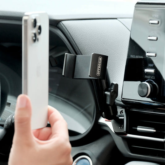 Image of Offroam Phone Mount installed securely in Toyota Sienna 2021-2025. This premium phone mount installs easily without drilling or glue. Spring loaded Universal holder for use with any phone. Perfect placement without blocking screens, driver view, or air flow. Fully adjustable positioning.