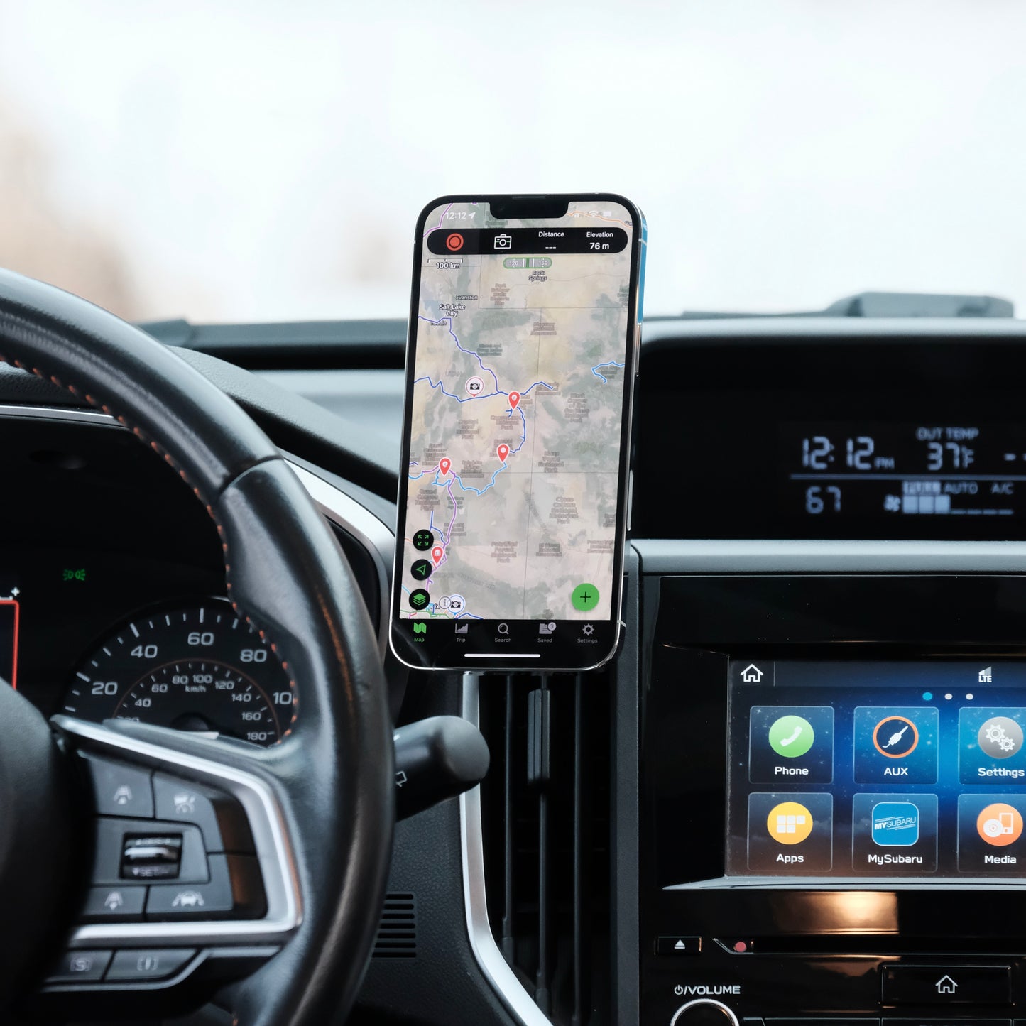 Image of Offroam MagSafe-compatible Phone Mount installed securely in Subaru Crosstrek 2018-2023 | Forester 2019-2024| Impreza 2017-2023. This premium phone mount installs easily without drilling or glue. High force magnets hold phone on any trail, road, or track. Perfect placement without blocking screens, driver view, or air flow. Fully adjustable positioning.